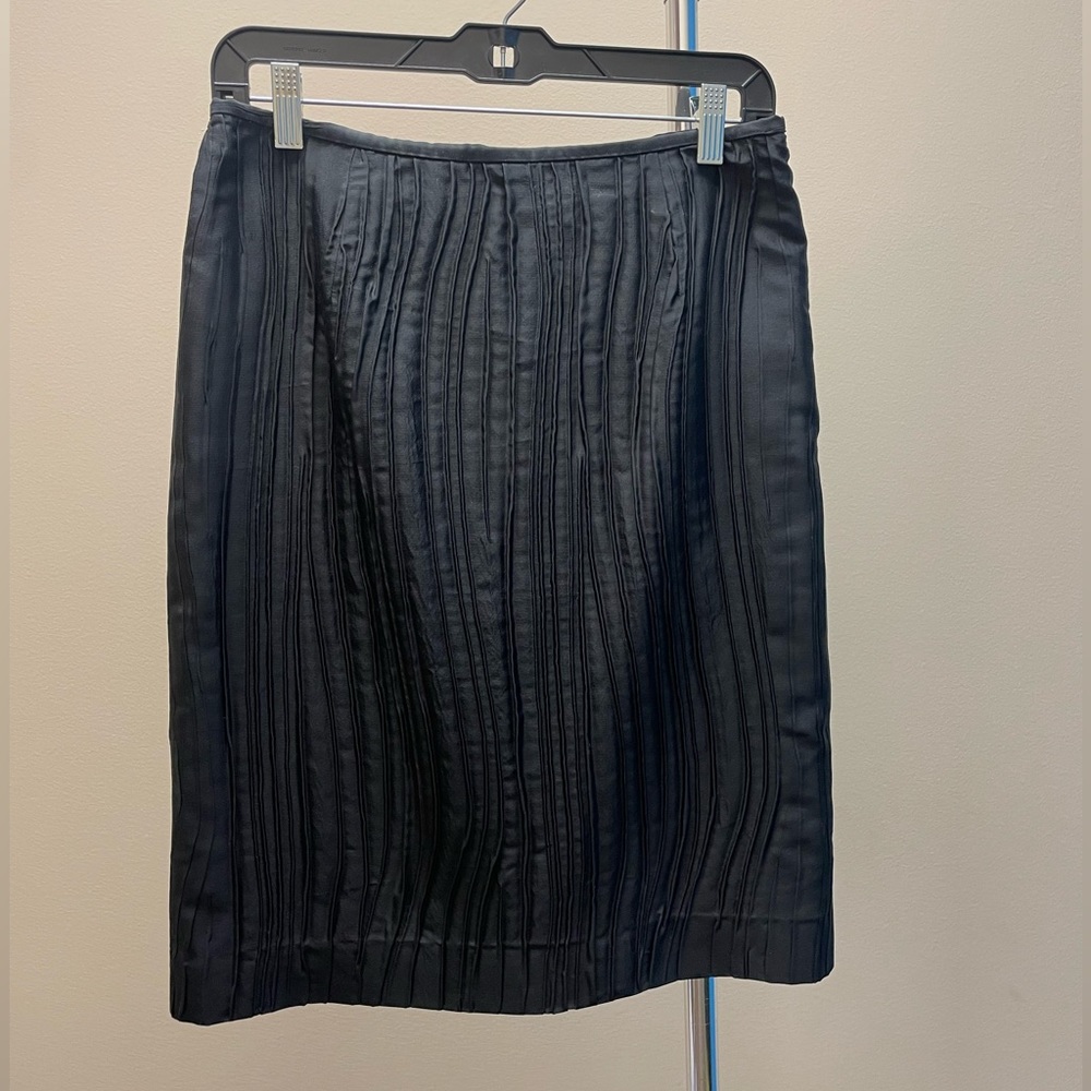 Black crinkle crease taffeta skirt.